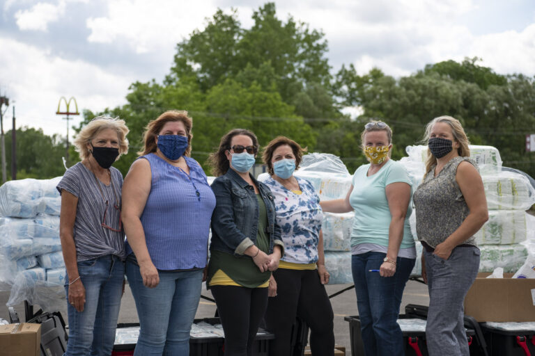 volunteers wearing face coverings